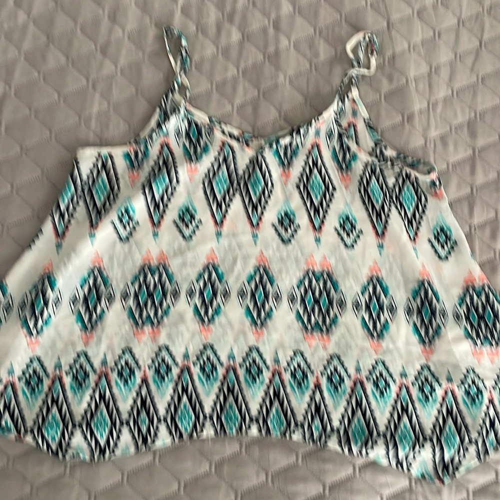SOLDCute spaghetti strap “swing” tank.